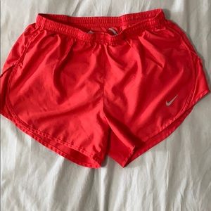 Orange Nike shorts
